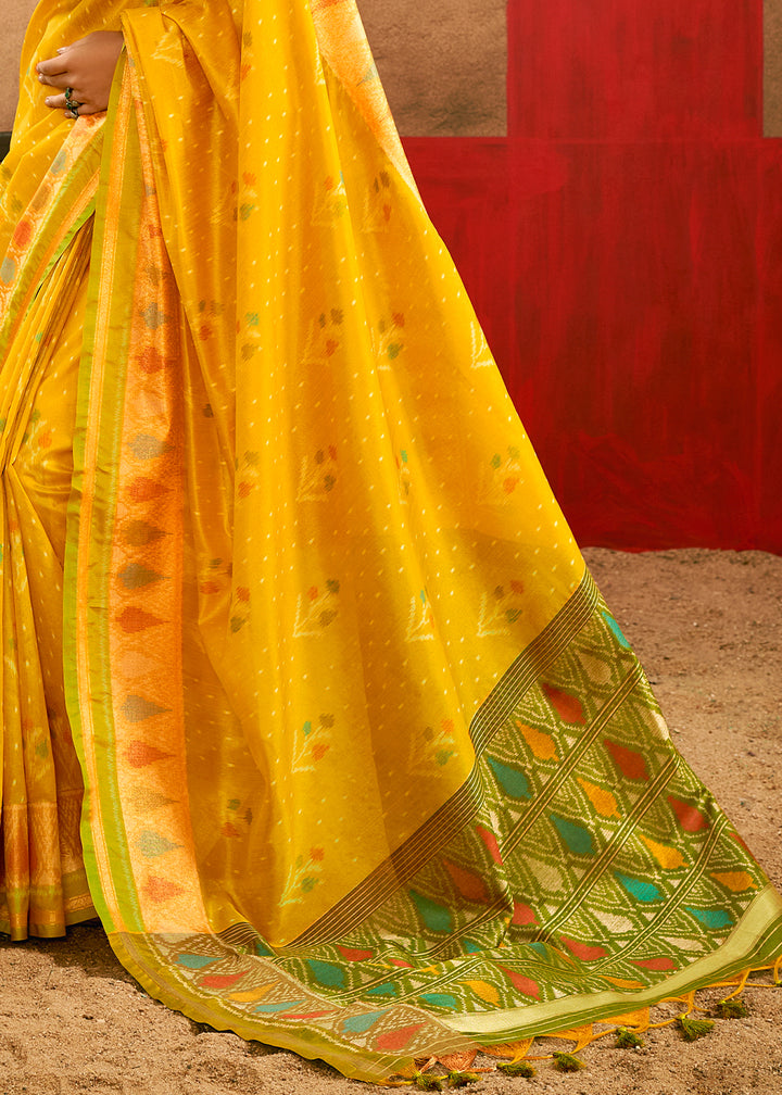 Saffron Yellow Patola Silk Saree with Intricate Design