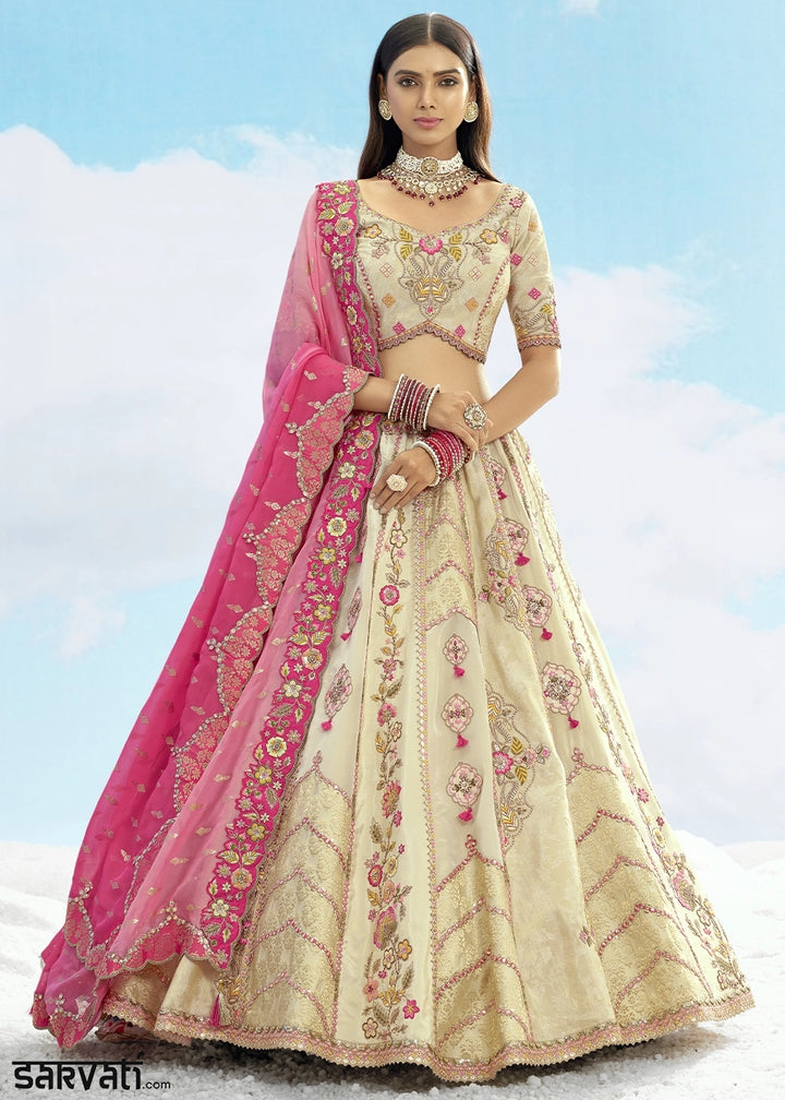 Parchment White Banarasi Silk Lehenga Choli with Intricate Embroidery and Cut Work