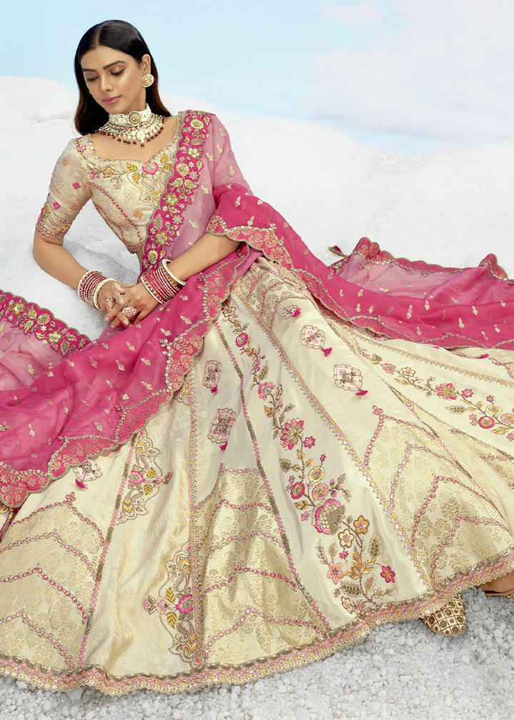 Parchment White Banarasi Silk Lehenga Choli with Intricate Embroidery and Cut Work