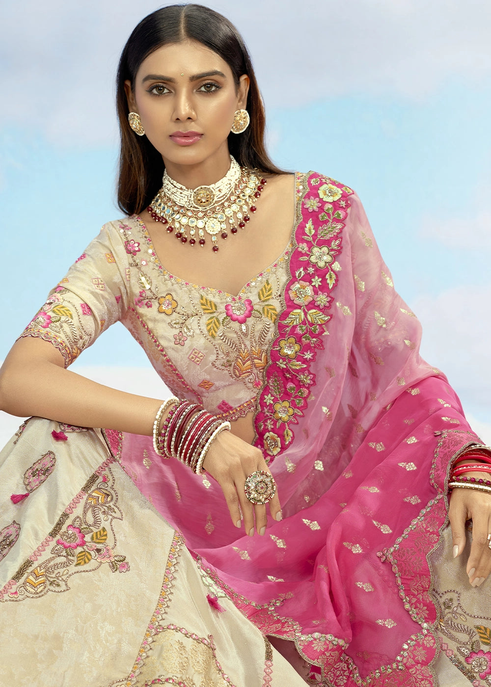 Parchment White Banarasi Silk Lehenga Choli with Intricate Embroidery and Cut Work