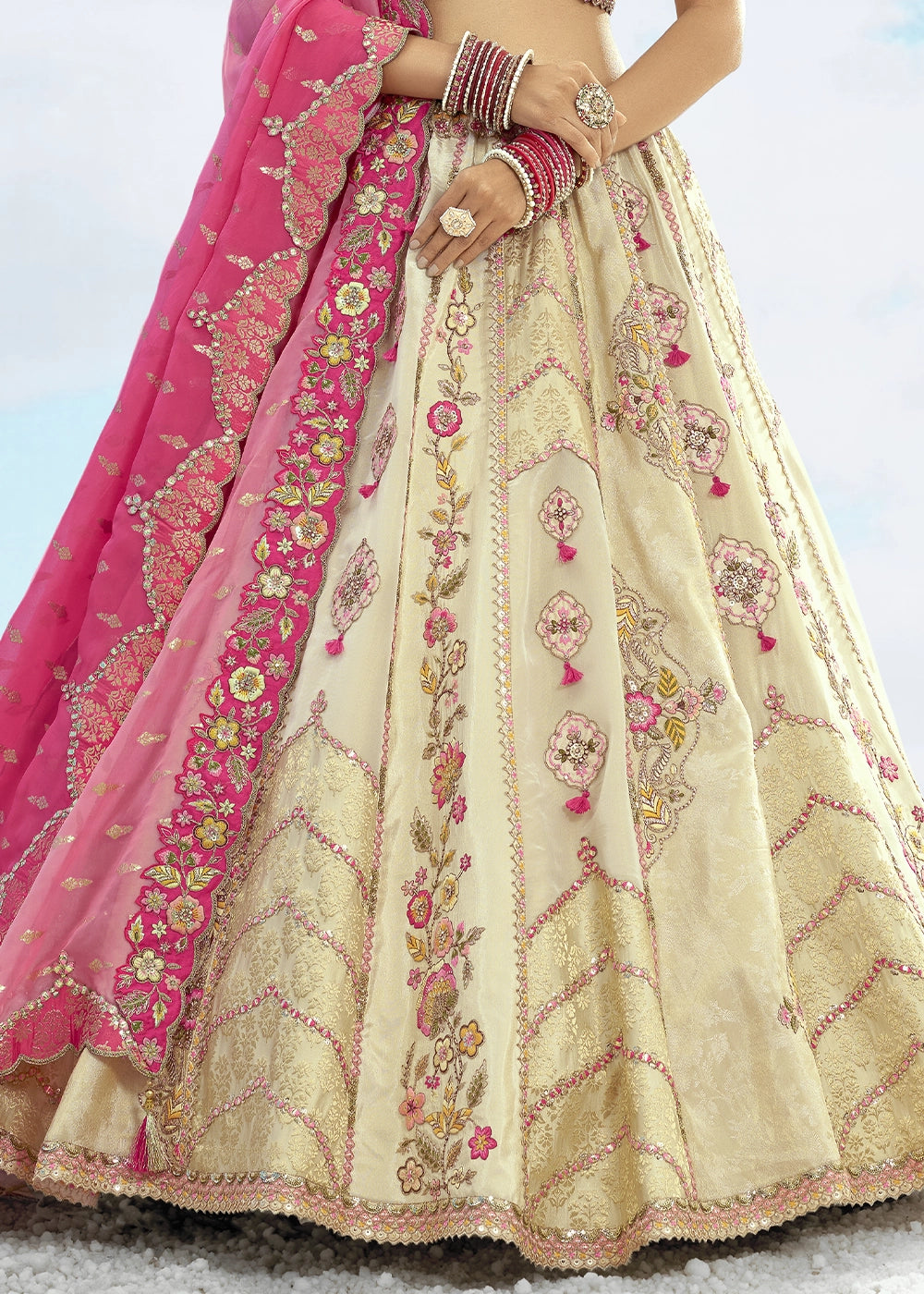 Parchment White Banarasi Silk Lehenga Choli with Intricate Embroidery and Cut Work