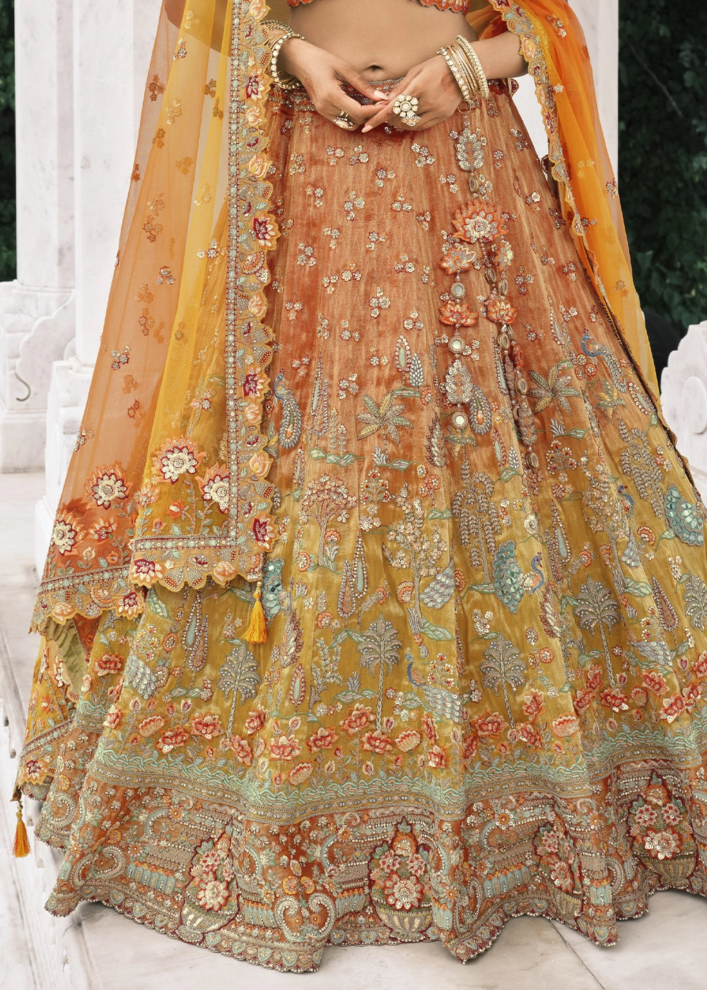 Shades Of Orange Banarasi Silk Lehenga with Stone, Sequins, Mirror & Zari Handwork