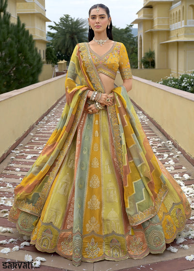 Shades Of Yellow Banarasi Silk Lehenga Choli with Stones, Sequins & Heavy Cut Work Border