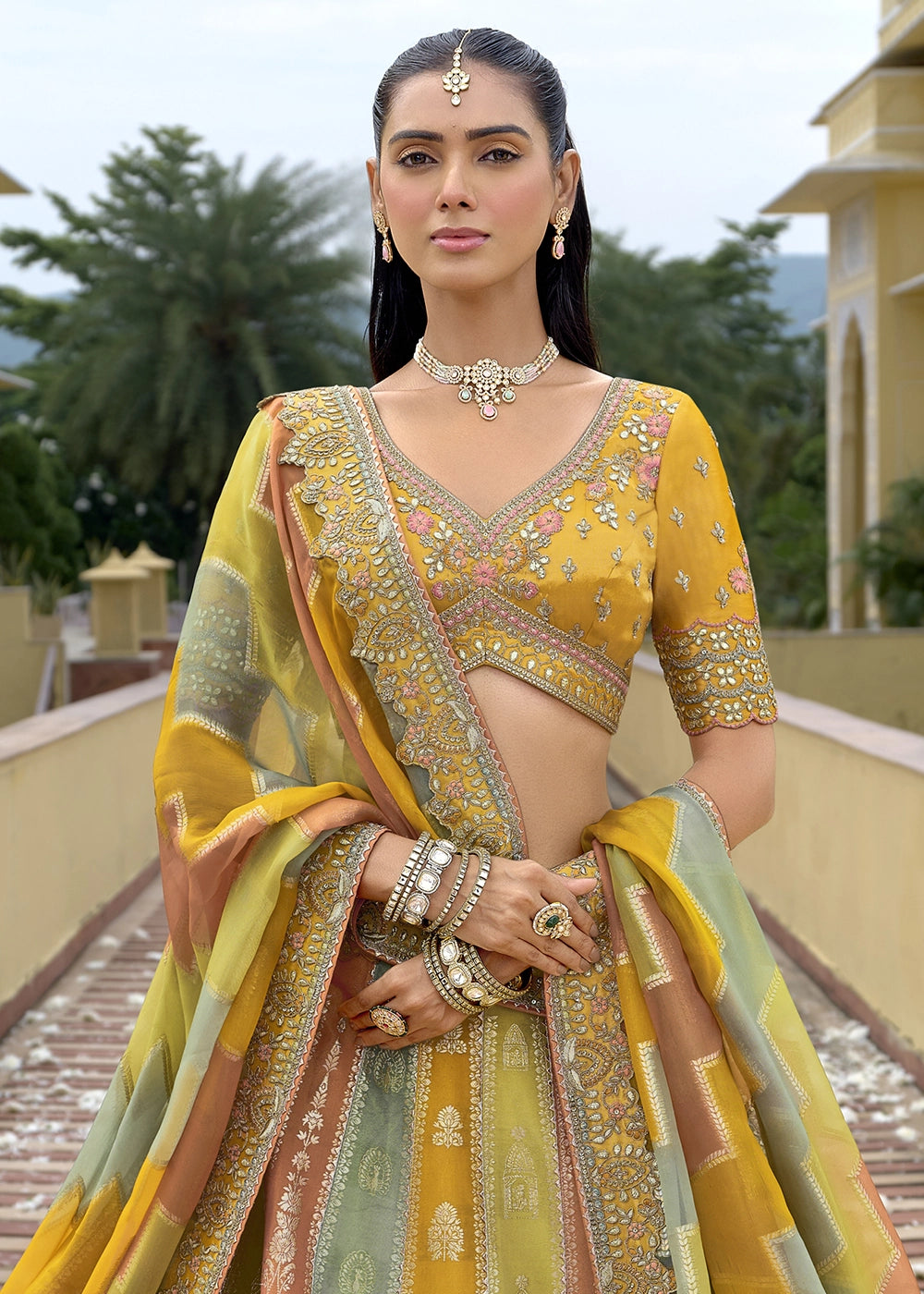Shades Of Yellow Banarasi Silk Lehenga Choli with Stones, Sequins & Heavy Cut Work Border