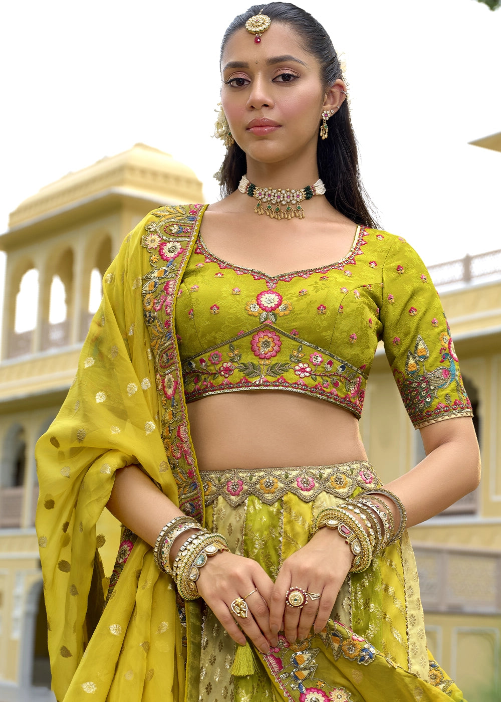 Olive Green Banarasi Silk Lehenga Choli with Stones, Sequins & Heavy Cut Work Border