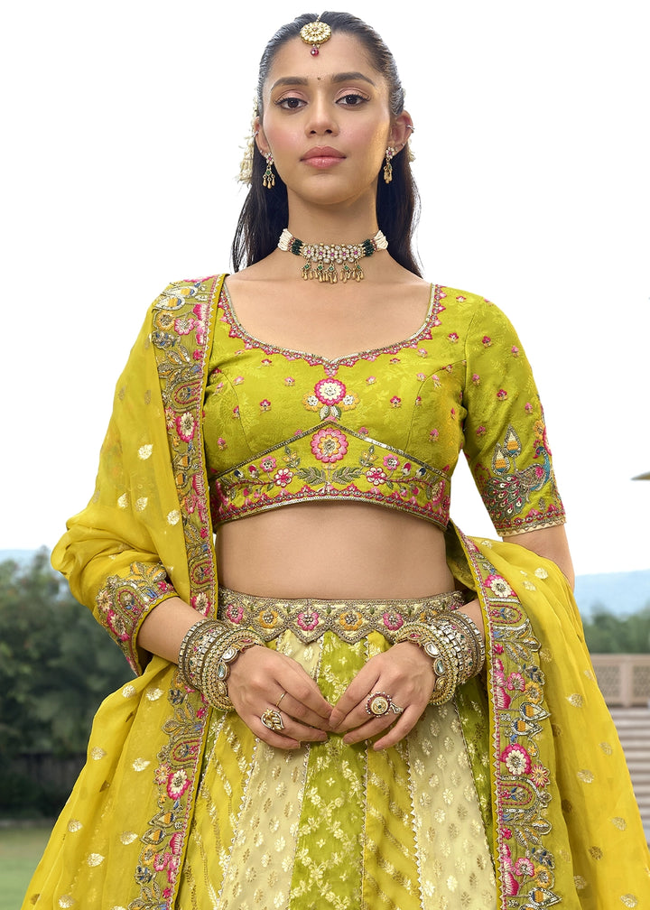 Olive Green Banarasi Silk Lehenga Choli with Stones, Sequins & Heavy Cut Work Border