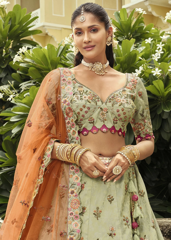 Tea Green Banarasi Silk Embroidered Lehenga Choli with Heavy Cut Work & Mirror Detailing