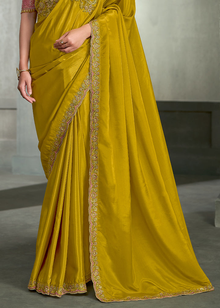 Mustard Yellow Crepe Silk Saree with Sequin and threadwork Pallu and Designer Blouse.