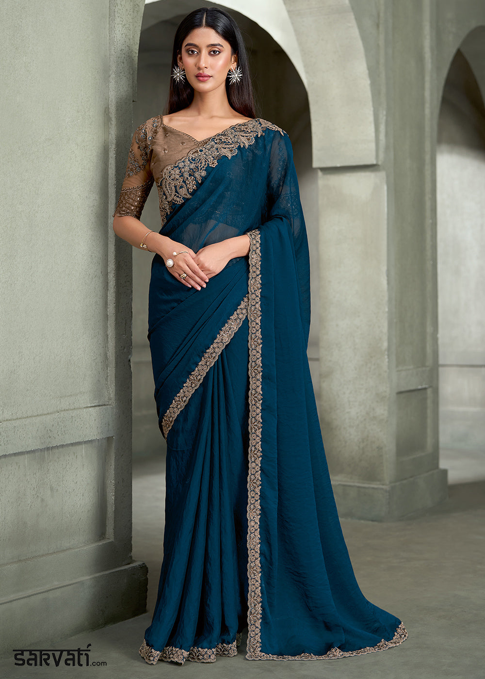 Peacock Blue Georgette Saree with Embroidered Border &amp; Designer Blouse