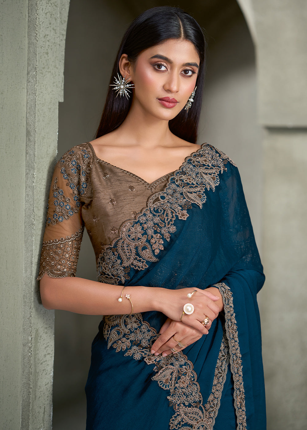 Peacock Blue Georgette Saree with Embroidered Border &amp; Designer Blouse
