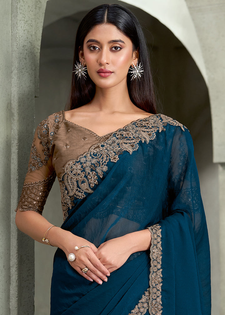 Peacock Blue Georgette Saree with Embroidered Border &amp; Designer Blouse
