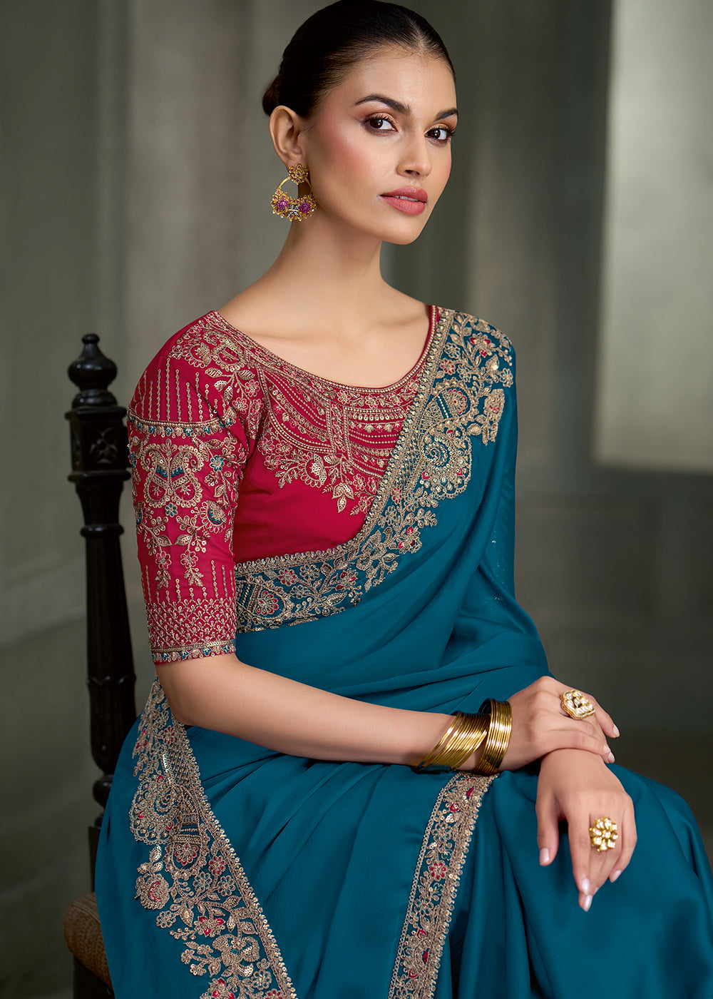 Teal Blue Crepe Silk Saree with Intricate Floral Embroidered Zari Border