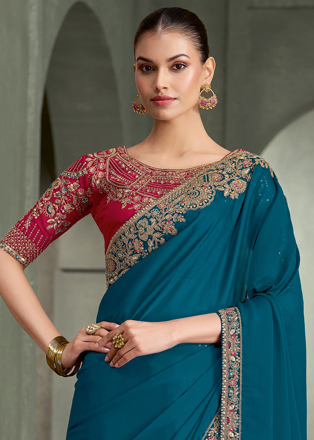 Teal Blue Crepe Silk Saree with Intricate Floral Embroidered Zari Border