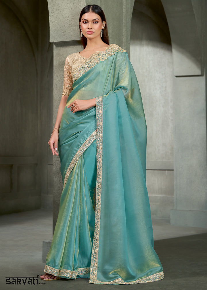 Aqua Blue &amp; Gold Shimmer Dual Tone Tissue Silk Saree with Zari Embroidered Border