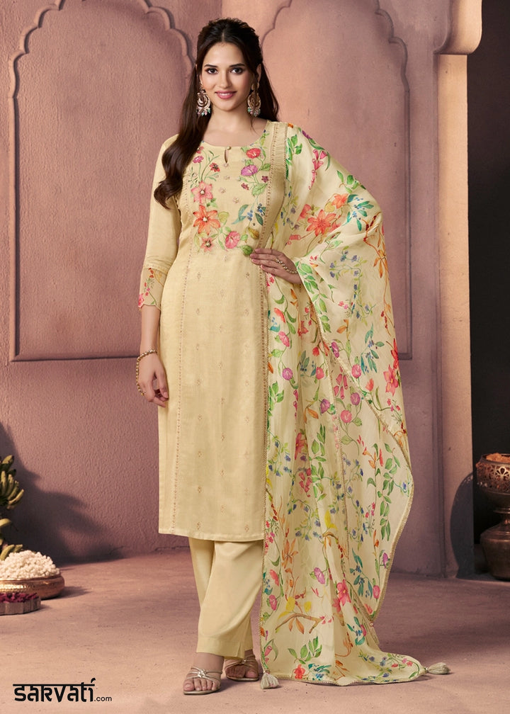 Bright Ivory White Dola Silk Suit with Ethnic Motifs & Bead-Work Accents