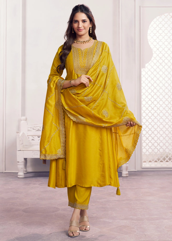 Yellow Embroidery A-Line Kurta With Dyed Trousers And Embroidery Dupatta