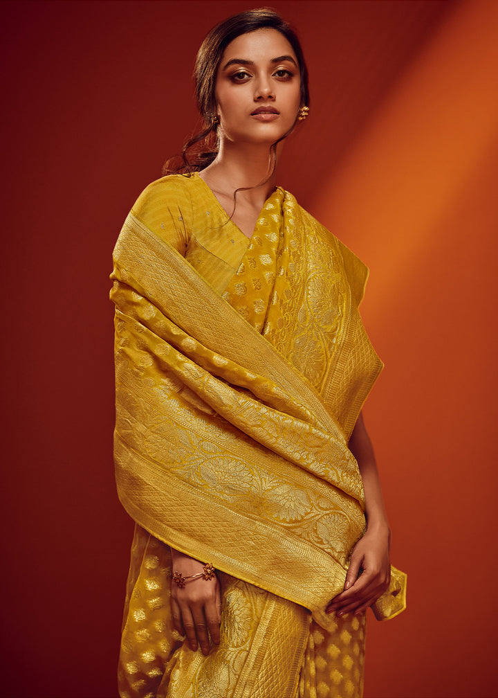 Shades Of Yellow Viscose Georgette Saree Adorned with Zari Woven Detailing