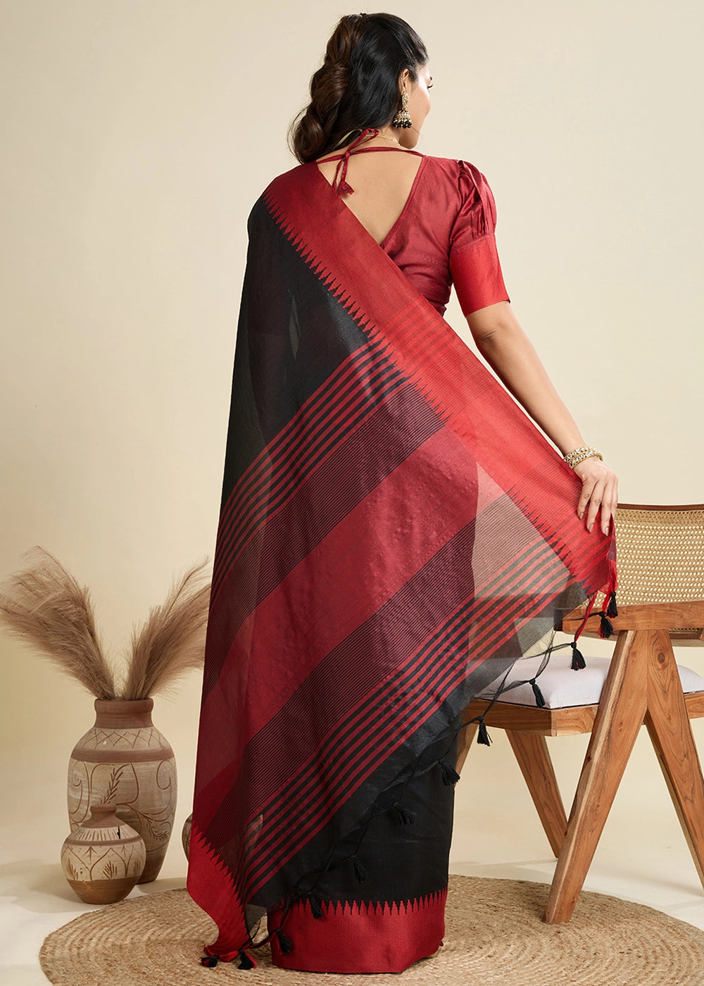 Midnight Black Raw Silk Saree Adorned with Temple Style Border