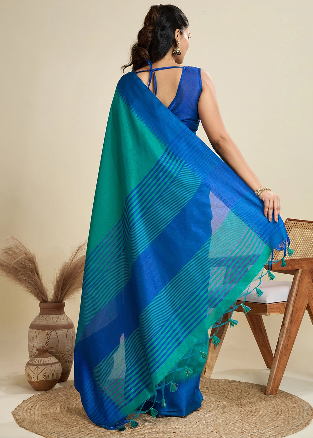 Shaded Blue Raw Silk Saree Adorned with Temple Style Border
