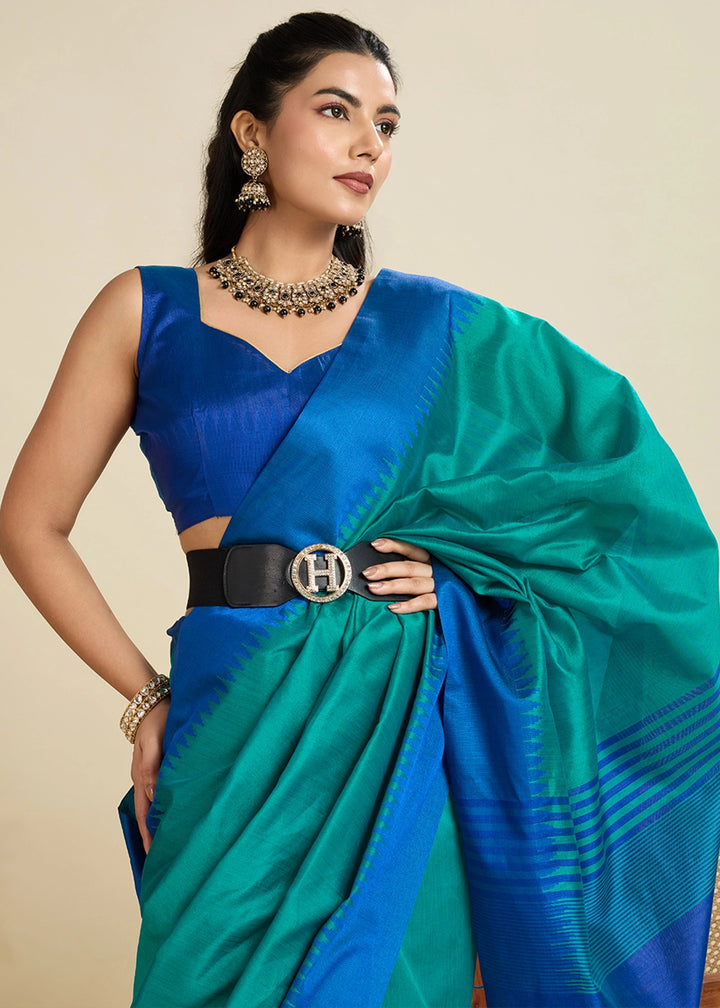 Shaded Blue Raw Silk Saree Adorned with Temple Style Border