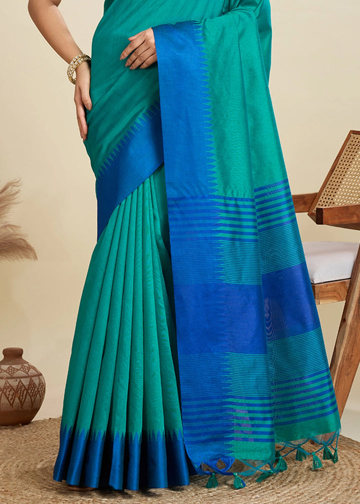 Shaded Blue Raw Silk Saree Adorned with Temple Style Border