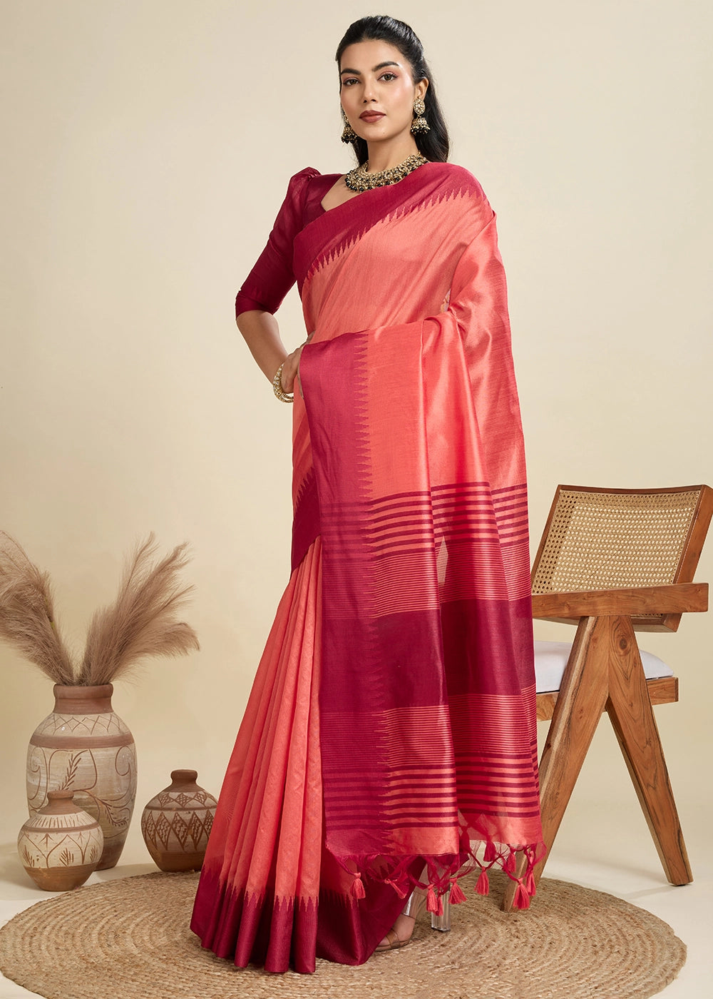 Gajri Pink Raw Silk Saree Adorned with Temple Style Border