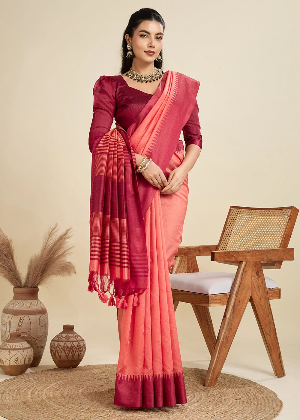 Gajri Pink Raw Silk Saree Adorned with Temple Style Border