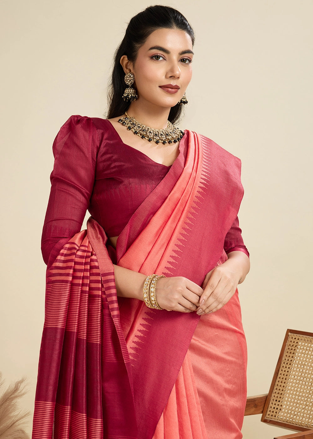 Gajri Pink Raw Silk Saree Adorned with Temple Style Border