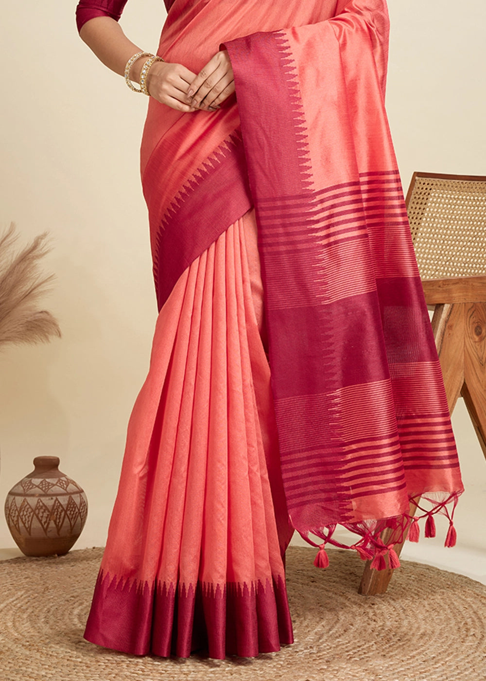 Gajri Pink Raw Silk Saree Adorned with Temple Style Border