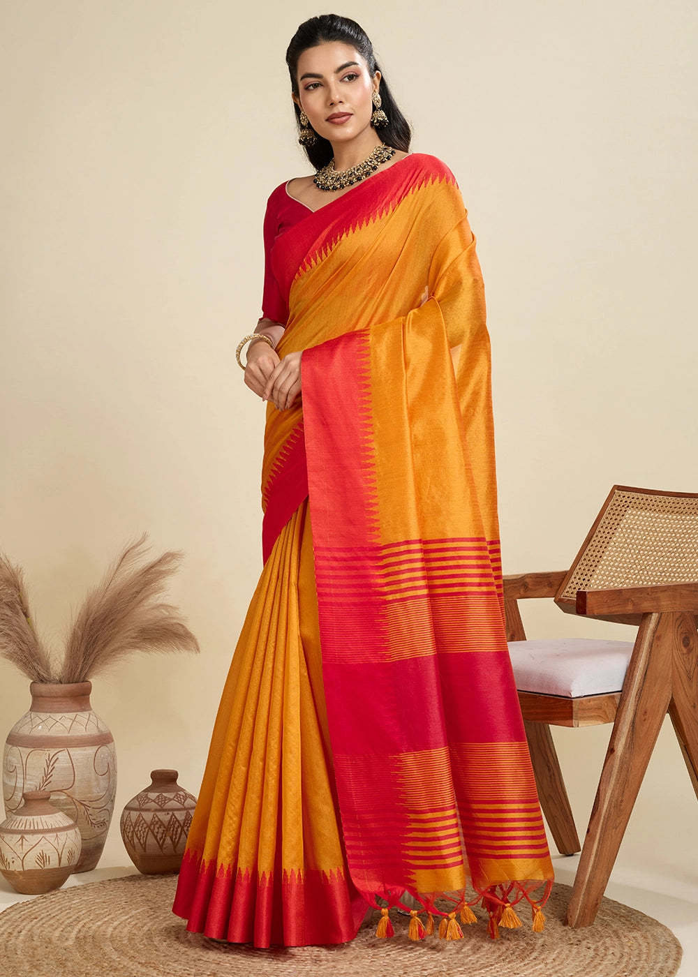 Mustard Yellow Raw Silk Saree Adorned with Temple Style Border