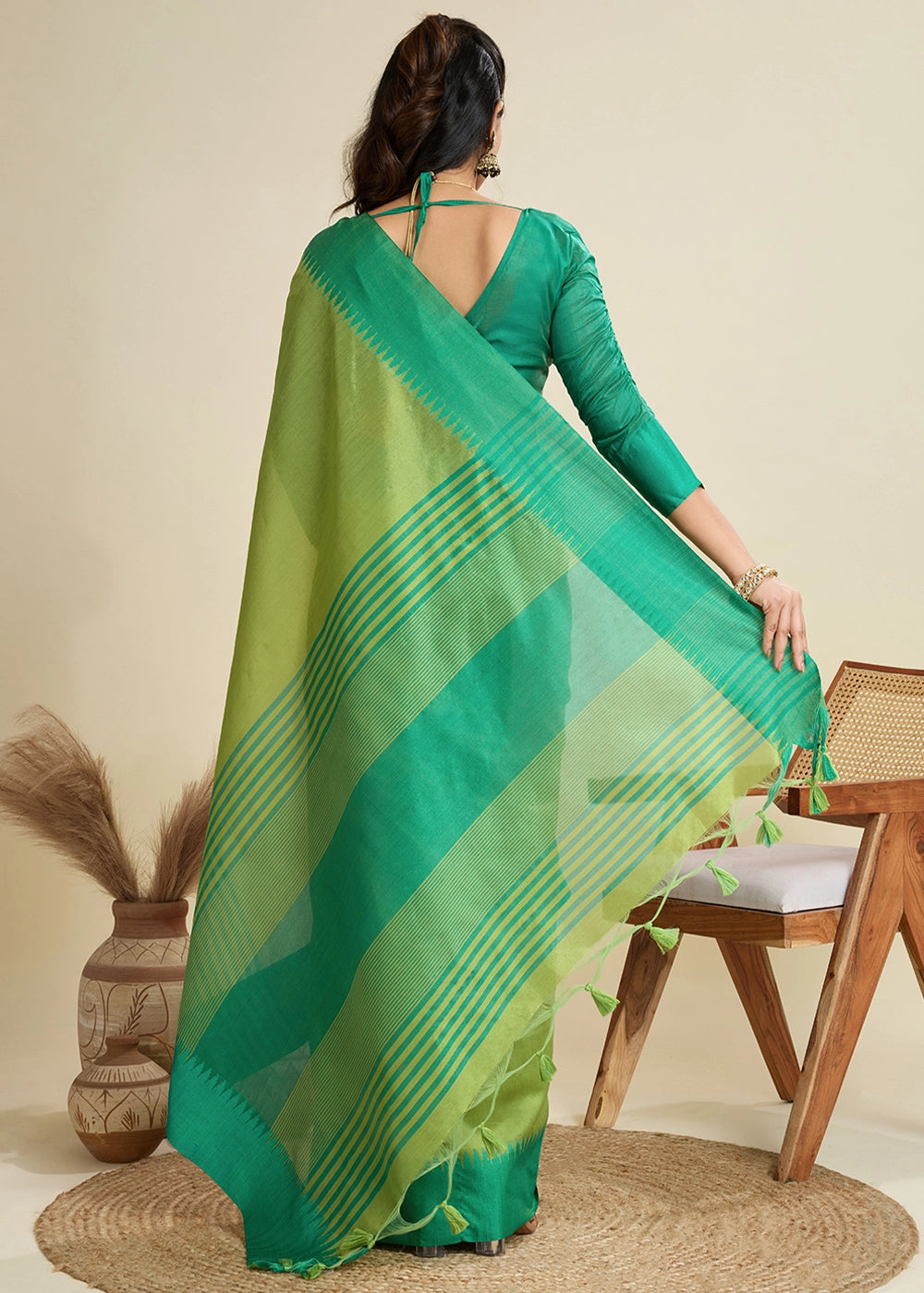 Limerick Green Raw Silk Saree Adorned with Temple Style Border