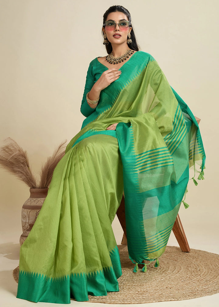 Limerick Green Raw Silk Saree Adorned with Temple Style Border