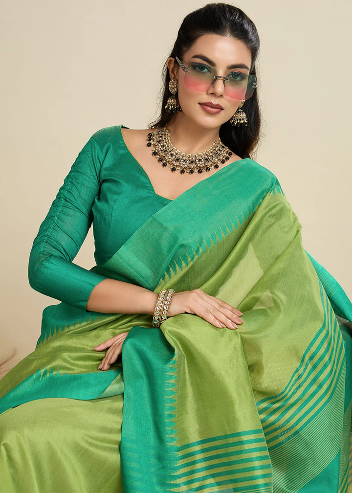 Limerick Green Raw Silk Saree Adorned with Temple Style Border