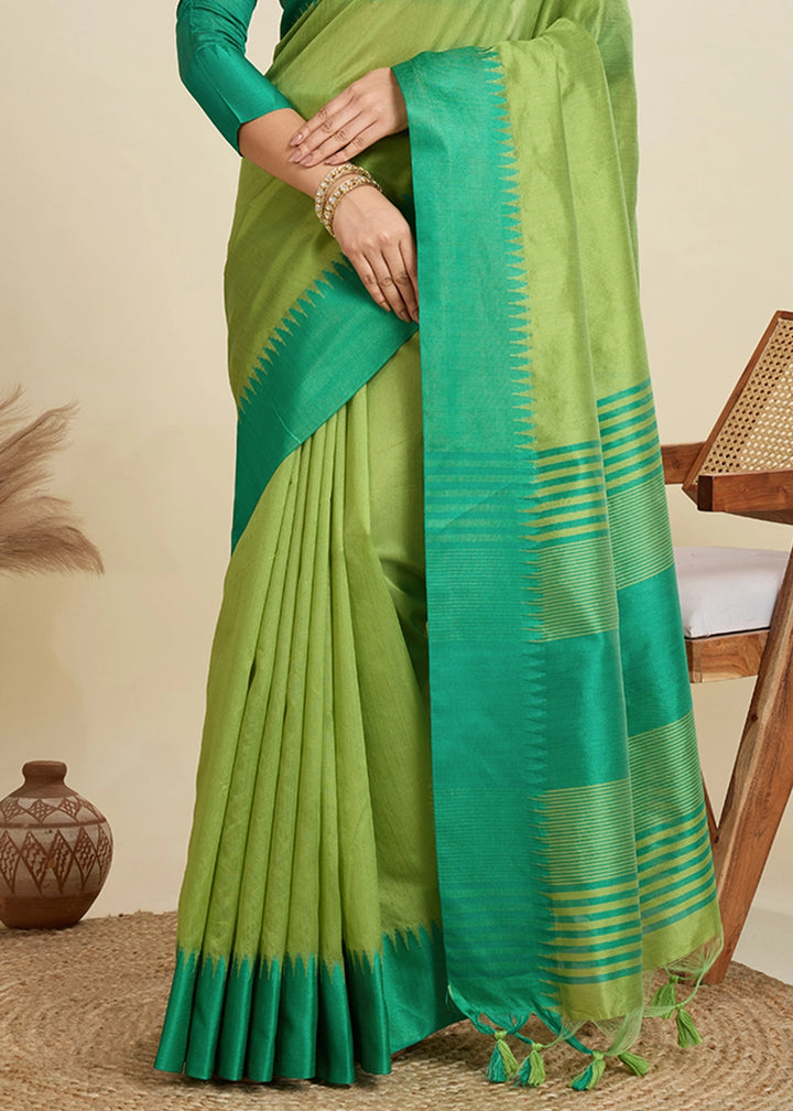 Limerick Green Raw Silk Saree Adorned with Temple Style Border