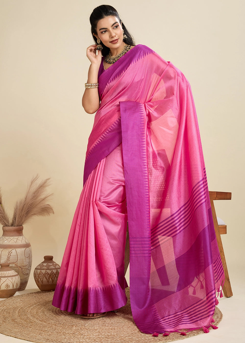 Shocking Pink Raw Silk Saree Adorned with Temple Style Border