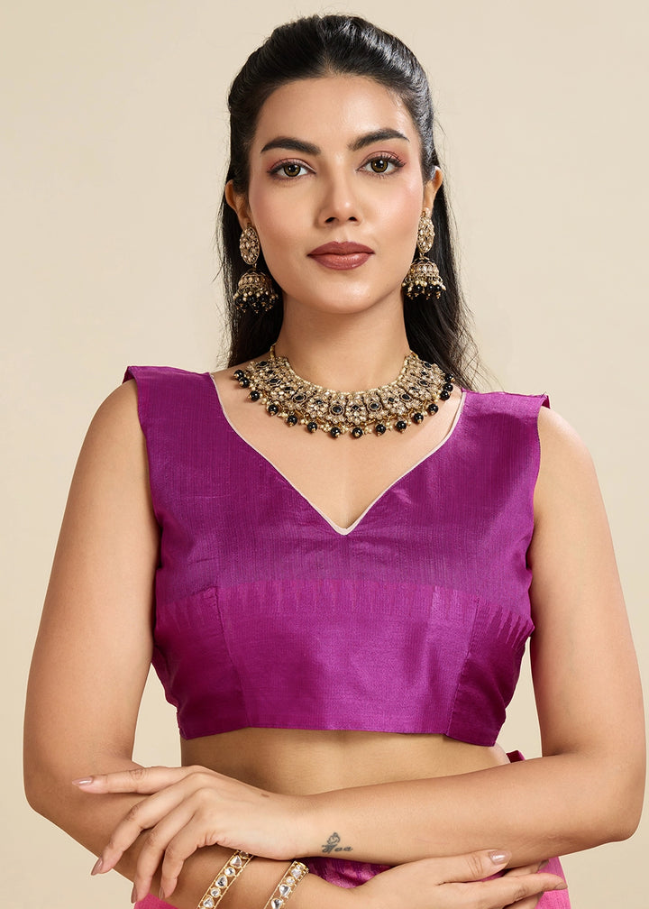 Shocking Pink Raw Silk Saree Adorned with Temple Style Border