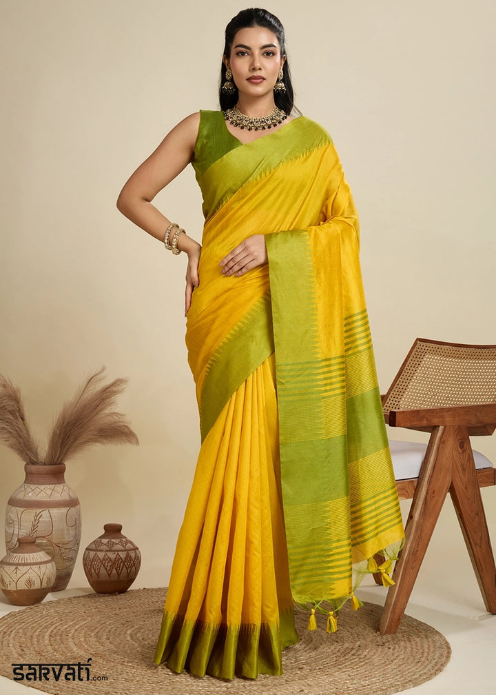 Canary Yellow Raw Silk Saree Adorned with Temple Style Border