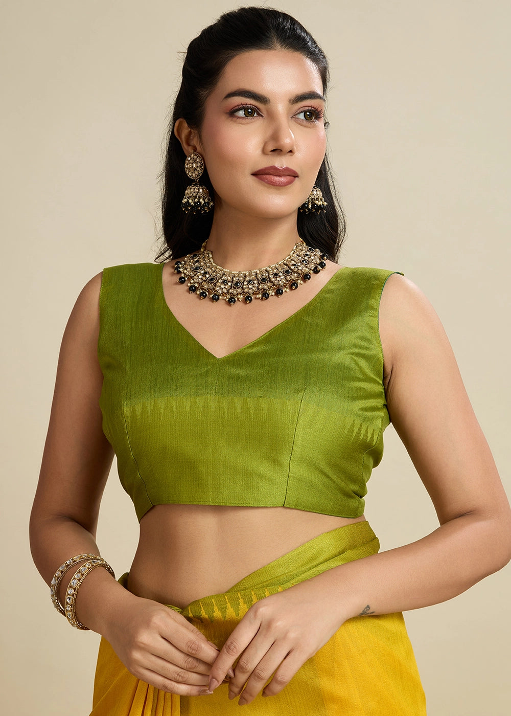 Canary Yellow Raw Silk Saree Adorned with Temple Style Border