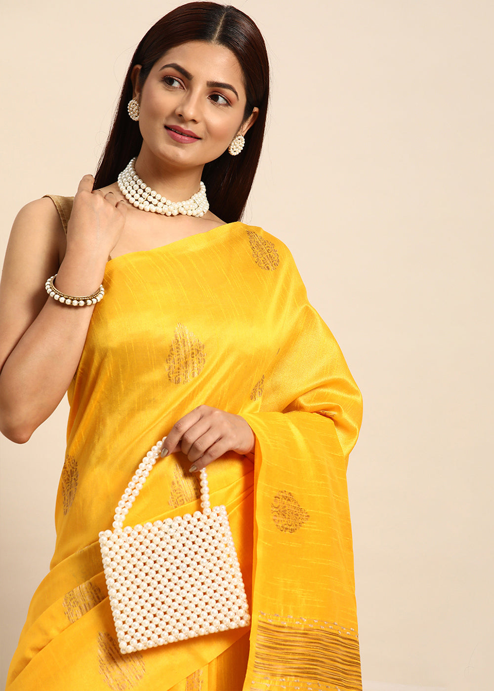 Saffron Yellow Raw Silk Saree with Intricate Woven Butti and Artistic Pallu