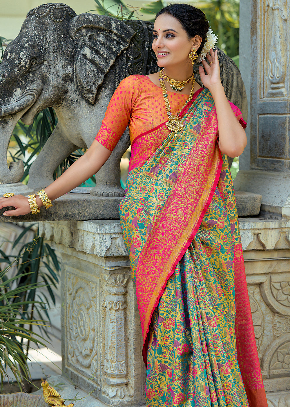 Pink & Green Kanjivaram Silk Saree Featuring All-Over Zari Weaving