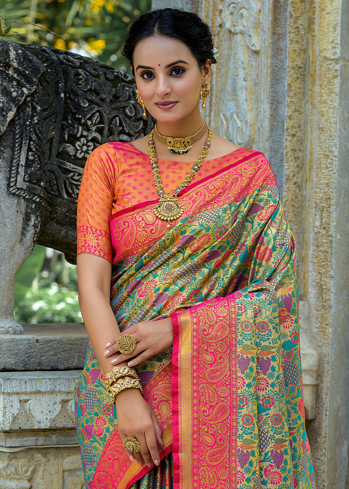 Pink & Green Kanjivaram Silk Saree Featuring All-Over Zari Weaving