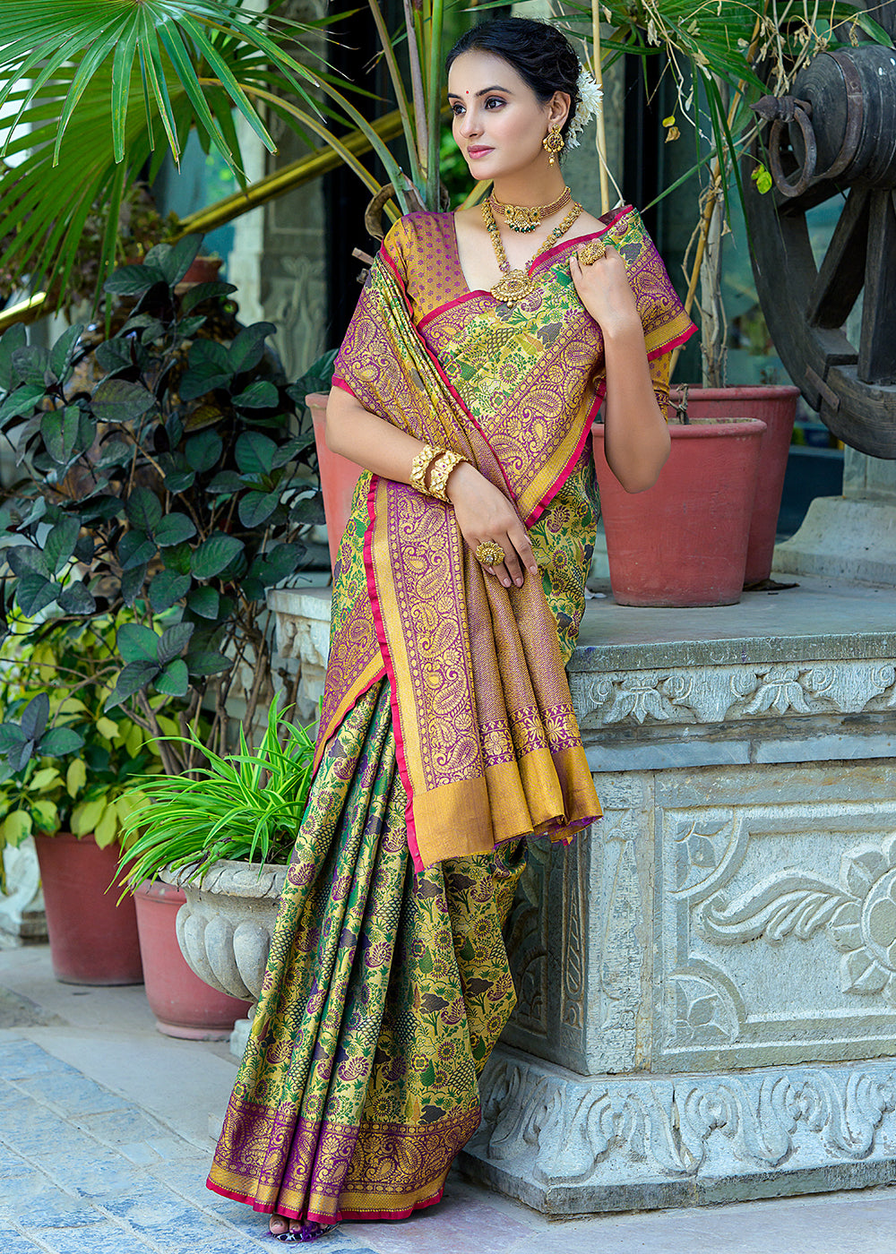 Green & Purple Kanjivaram Silk Saree Featuring All-Over Zari Weaving