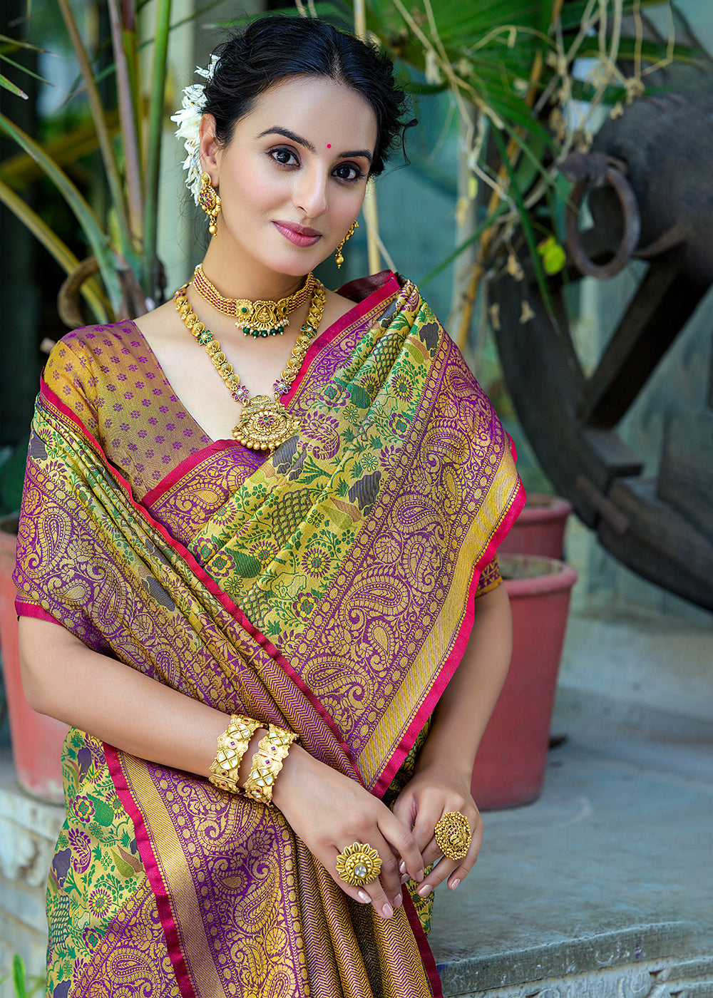 Green & Purple Kanjivaram Silk Saree Featuring All-Over Zari Weaving