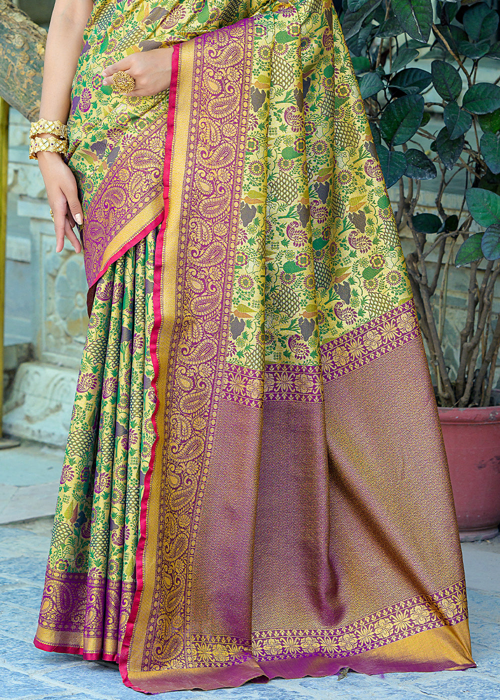 Green & Purple Kanjivaram Silk Saree Featuring All-Over Zari Weaving