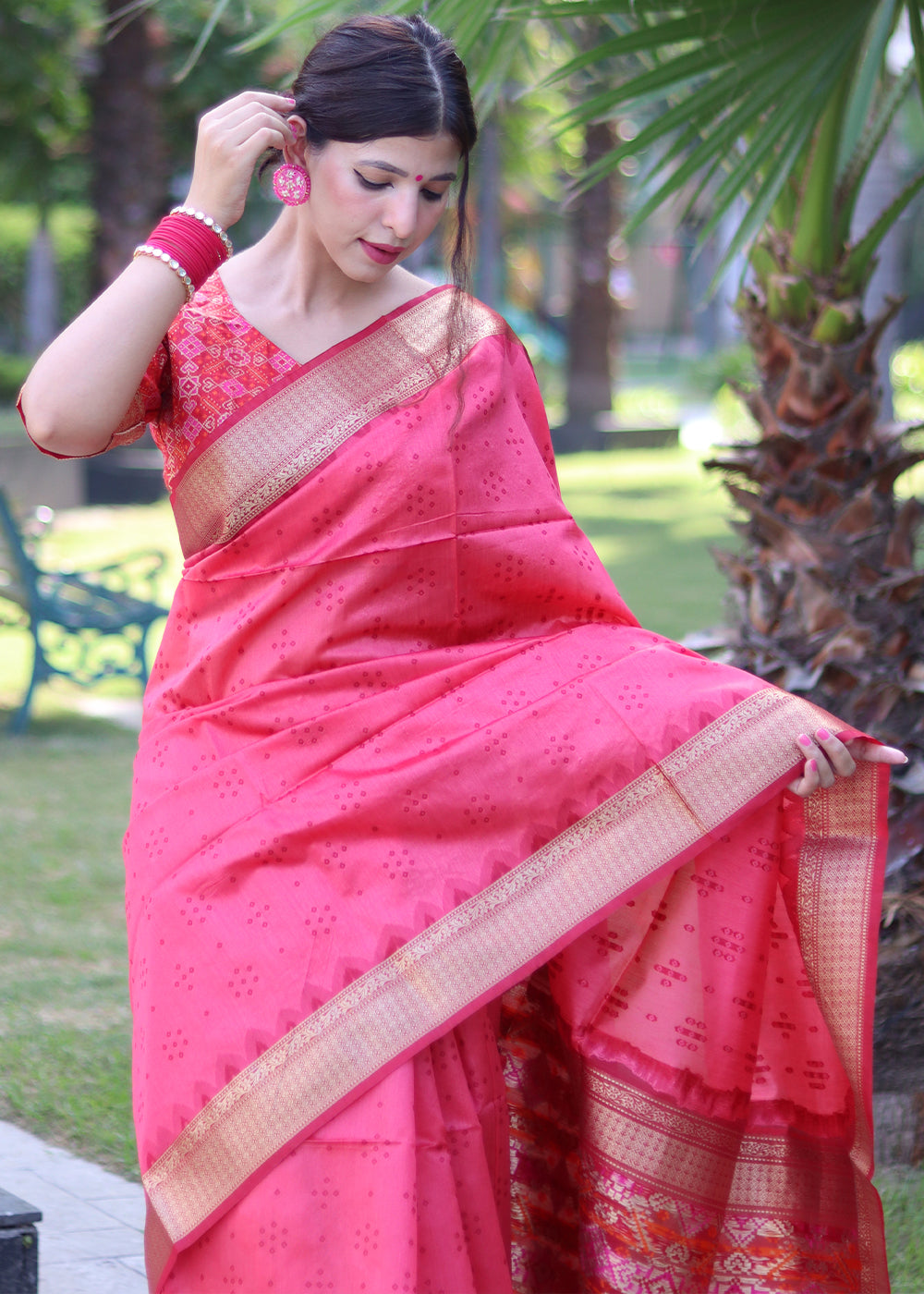 Hot Pink Raw Silk Saree with Intricate Patola Print & Zari Pallu