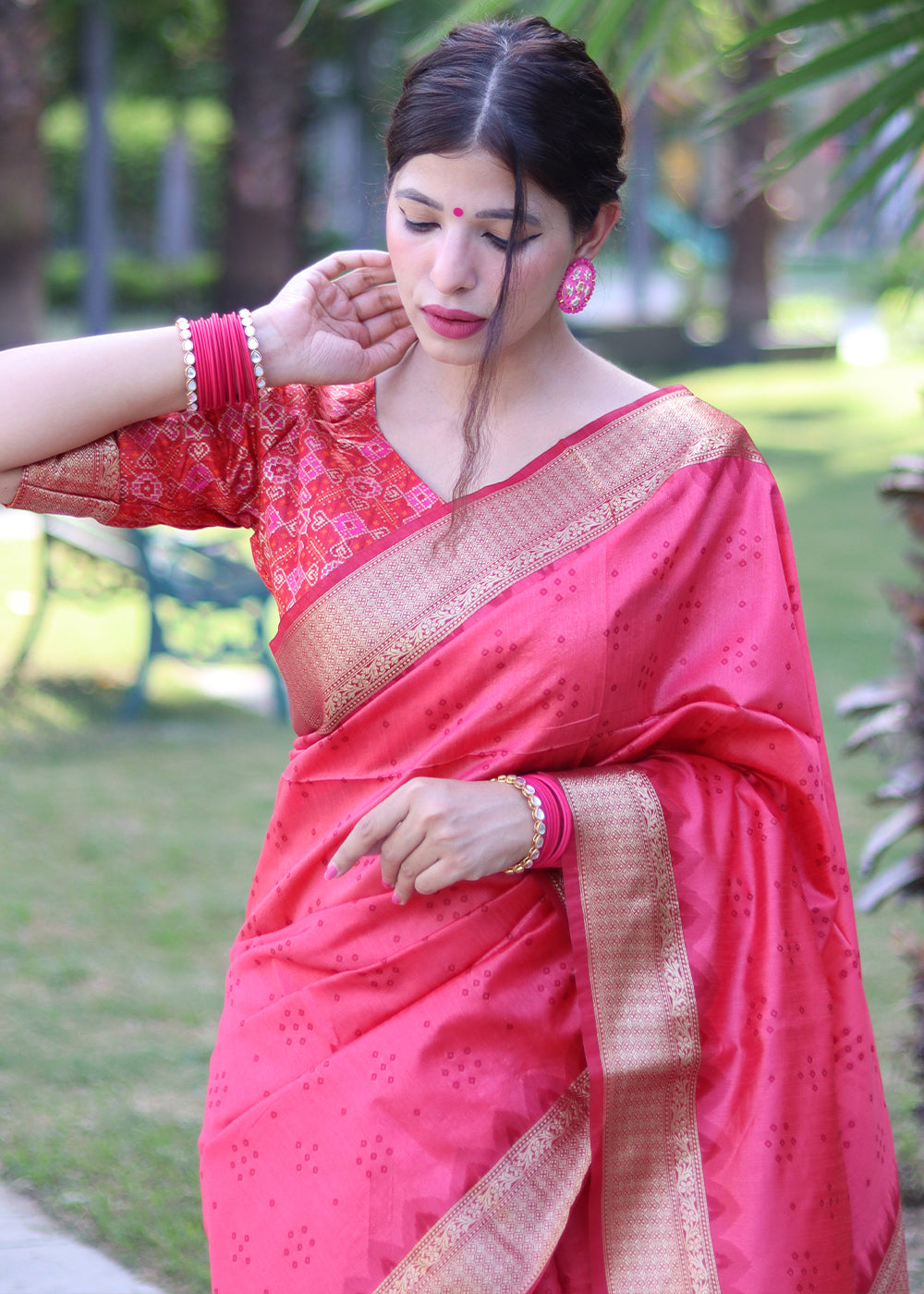 Hot Pink Raw Silk Saree with Intricate Patola Print & Zari Pallu