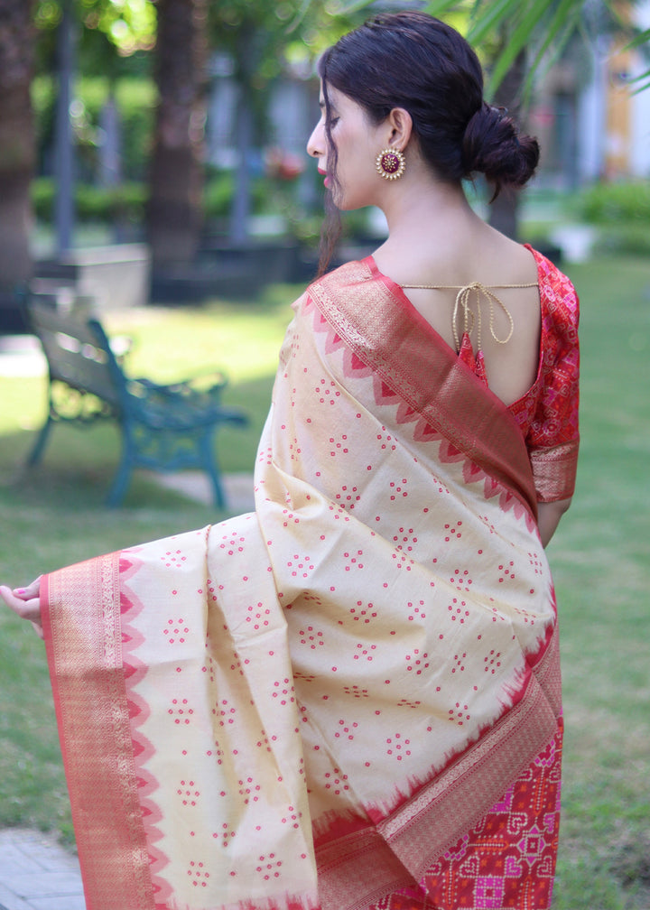 Cream White Raw Silk Saree with Intricate Patola Print & Zari Pallu