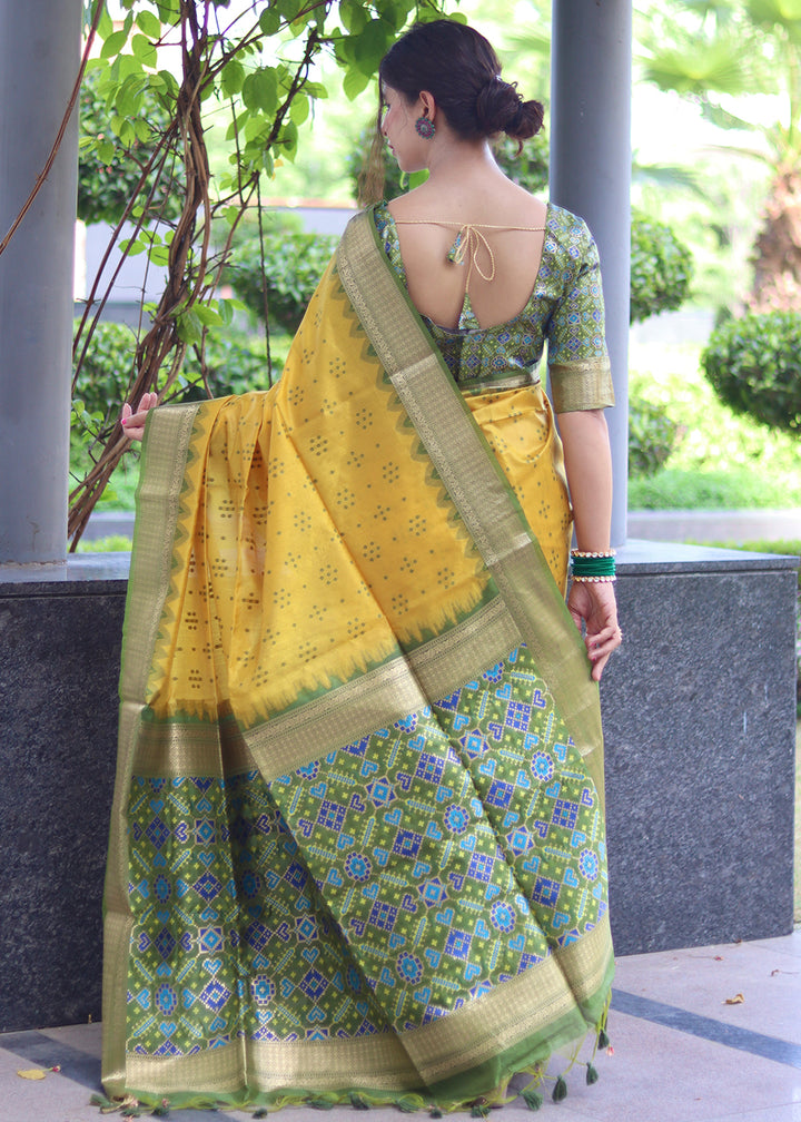 Aureolin Yellow Raw Silk Saree with Intricate Patola Print & Zari Pallu