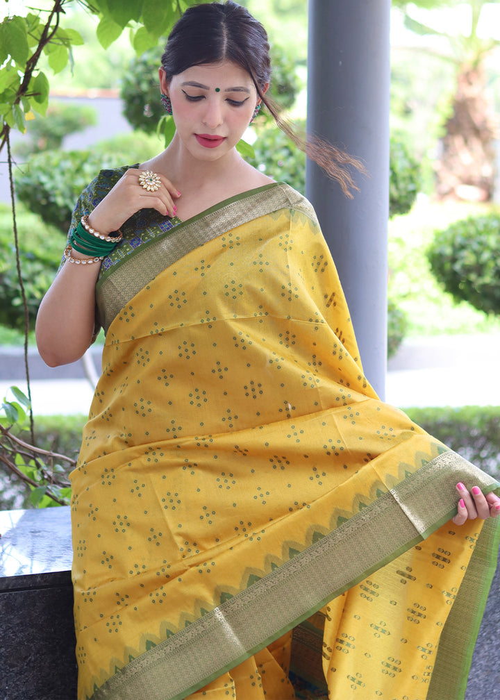 Aureolin Yellow Raw Silk Saree with Intricate Patola Print & Zari Pallu