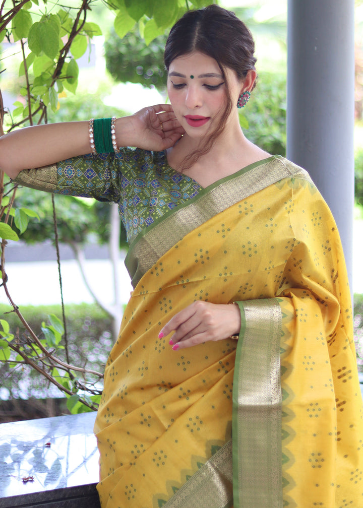 Aureolin Yellow Raw Silk Saree with Intricate Patola Print & Zari Pallu